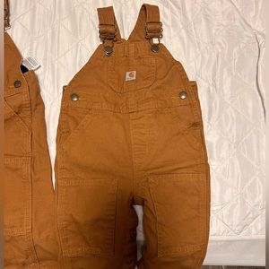 12 Month Carhartt overalls. I HAVE TWO OF THEM in this size! Sold separately.